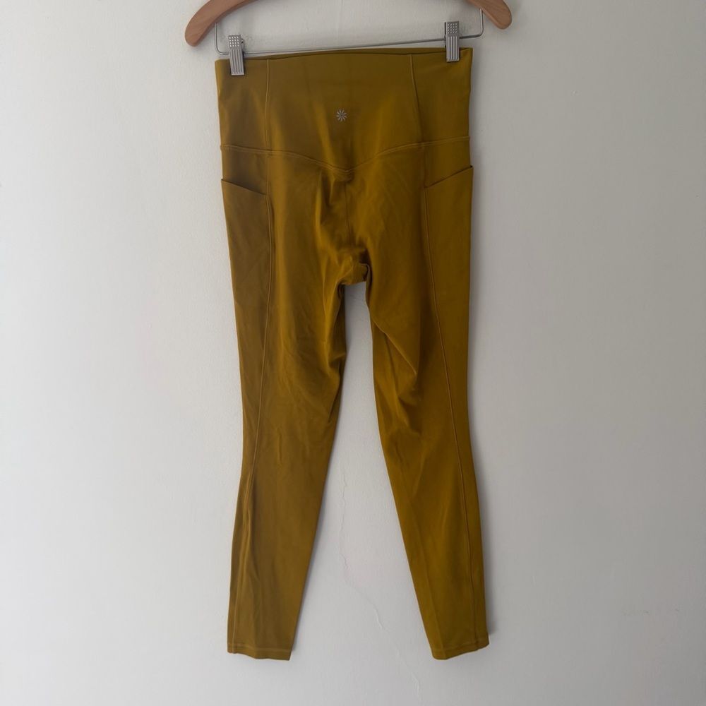 Athleta Leggings Salutation Stash Mustard Yellow Gold Pockets Size Small